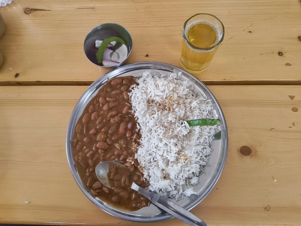 Pilgrims Enjoying Rajma Chawal Lunch During The Kedarnath Trek